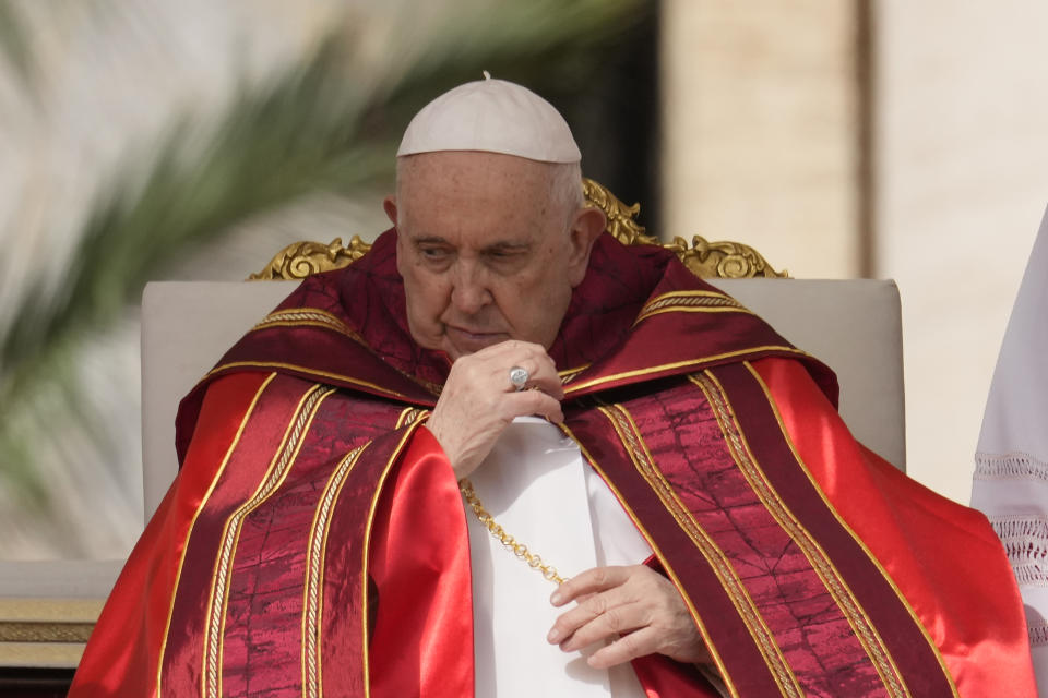 Pope Francis celebrates the Palm Sunday's mass in St. Peter's Square at The Vatican Sunday, April 2, 2023 a day after being discharged from the Agostino Gemelli University Hospital in Rome, where he has been treated for bronchitis, The Vatican said. The Roman Catholic Church enters Holy Week, retracing the story of the crucifixion of Jesus and his resurrection three days later on Easter Sunday. (AP Photo/Andrew Medichini)