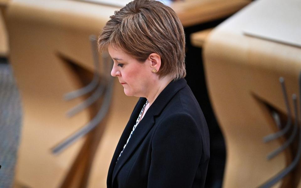 Nicola Sturgeon joins Scottish political party leaders as they take part in a motion of condolence for The Duke of Edinburgh at Scottish Parliament on Monday - PA