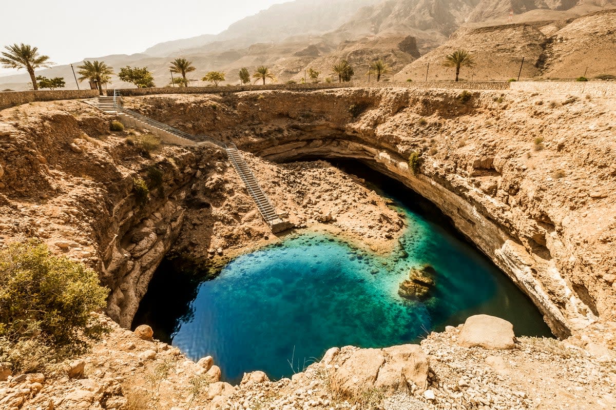The Bimmah Sinkhole lies near the eastern coast (Getty Images/iStockphoto)