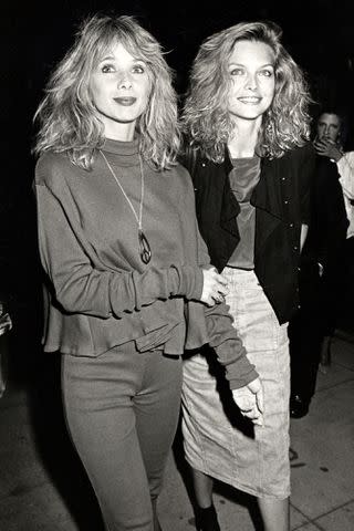 <p>Ron Galella/Ron Galella Collection via Getty</p> A young Michelle Pfeiffer and Rosanna Arquette