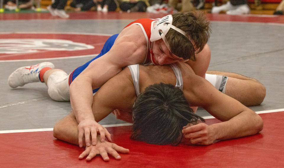 Ocean's James Farina (tpp) defeated St. Peter's Prep's Jonathan Fuller 5-3 in the Region 6 150-pound final.