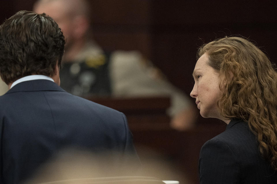 Kaitlin Armstrong sits with her defense lawyers during her murder trial at the Blackwell-Thurman Criminal Justice Center on Thursday, Nov. 16, 2023, in Austin, Texas. Armstrong is charged with killing of Anna "Mo" Wilson in May 2022. The 35-year-old Armstrong has pleaded not guilty. (Mikala Compton/Austin American-Statesman via AP, Pool)