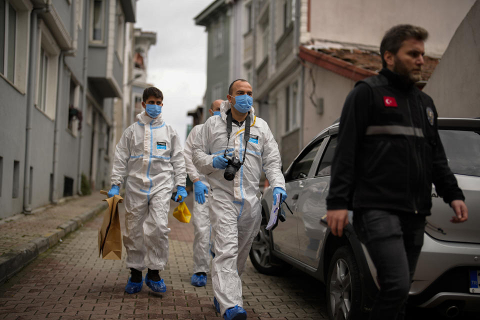 Turkish Police forensic officers arrive at Santa Maria church in Istanbul, Turkey, Sunday, Jan. 28, 2024. Two masked assailants attacked a church in Istanbul during Sunday services, killing one person, Turkish officials said. (AP Photo/Emrah Gurel)