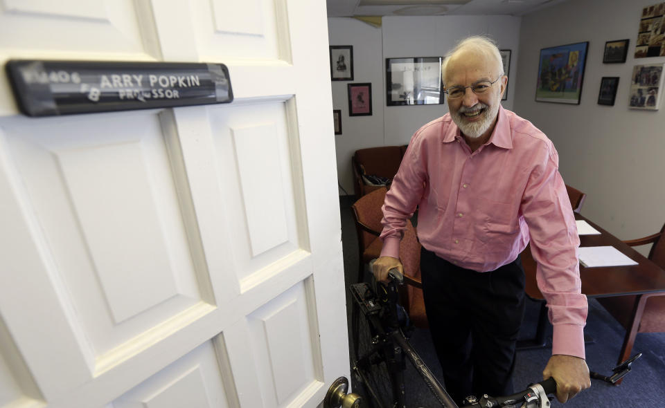 In this photo taken April 3, 2013, nutrition scholar Prof. Barry Popkin, head of the University of North Carolina Food Research Program, poses for a photo in his office at UNC-Chapel Hill. Popkin is leading a massive project of researchers who are studying what foods Americans are purchasing in stores and eating, and creating a gargantuan map, something he calls "mapping the food genome." "We're interested in improving the public's health and it really takes this kind of knowledge," he says. (AP Photo/Gerry Broome)