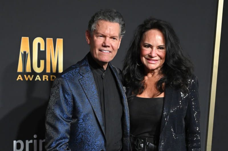 Randy Travis (L) and Mary Davis attend the Academy of Country Music Awards in 2023. File Photo by Ian Halperin/UPI