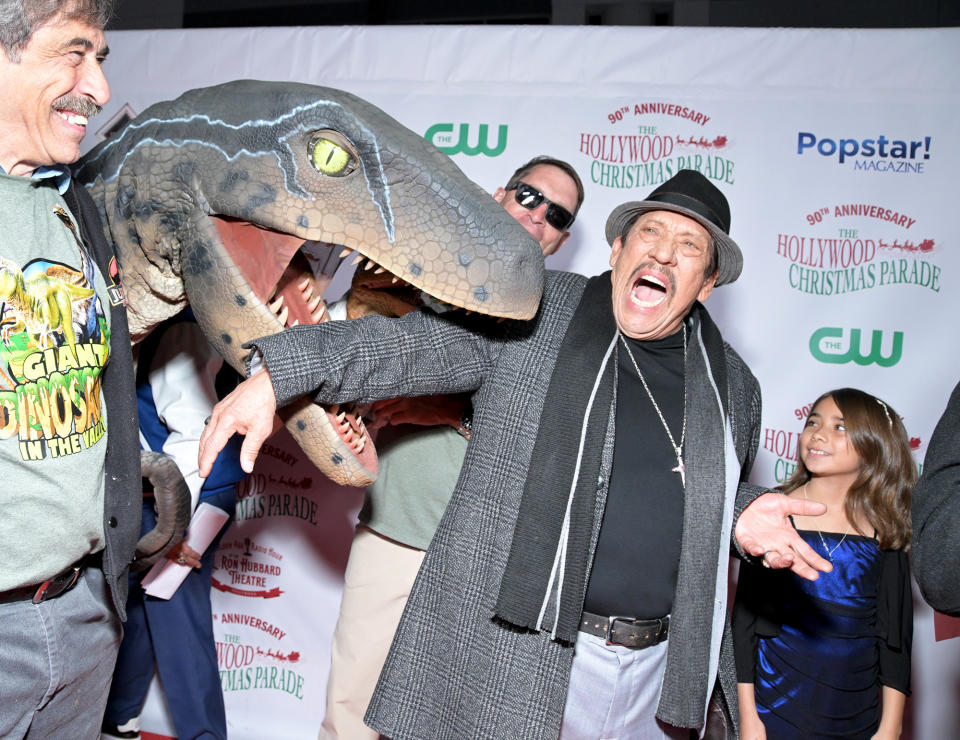 <p>Danny Trejo meets his reptilian match in one overzealous velociraptor while supporting Marine Toys For Tots at the 90th Anniversary of the Hollywood Christmas Parade on Nov. 27.</p>