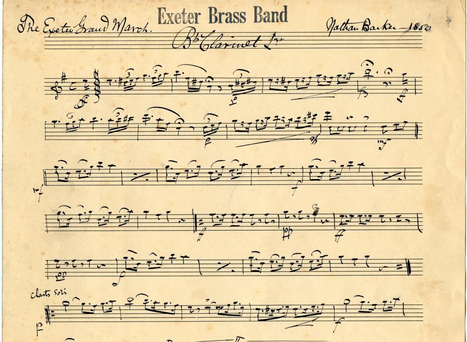 A handwritten musical score titled “The Exeter Grand March" by Nathan Barker.