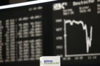 A box with text 'Frankfurt stock exchange' is pictured in front of the German share price index DAX board at the Frankfurt stock exchange, January 15, 2015. REUTERS/Kai Pfaffenbach