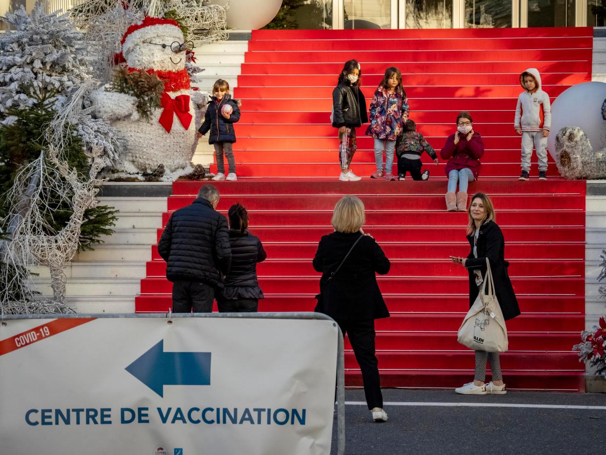 A sign for a coronavirus disease (COVID-19) vaccination center is installed in front of the red carpet of the Palace on Jan. 13, 2021, in Cannes, France.