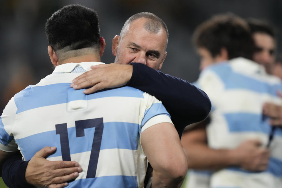 Argentina's coach Michael Cheika embraces Argentina's Tetaz Chaparro following their Rugby Championship test match against Australia in Sydney, Australia, Saturday, July 15, 2023. (AP Photo/Rick Rycroft)