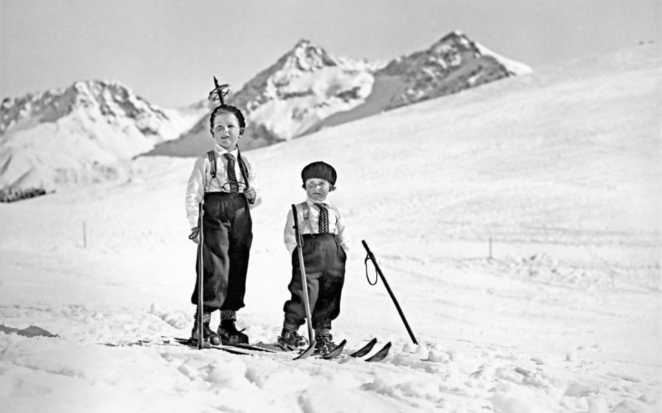 children skiing - Switzerland Tourism/Carl Brandt, Kulturarchiv Arosa