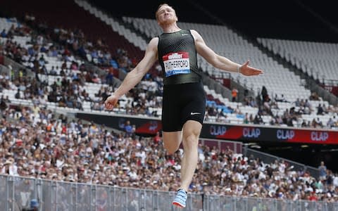 Rutherford defied the pain of an ankle injury to make one more jump in the stadium where he won Olympic gold in 2012 - Credit: AFP