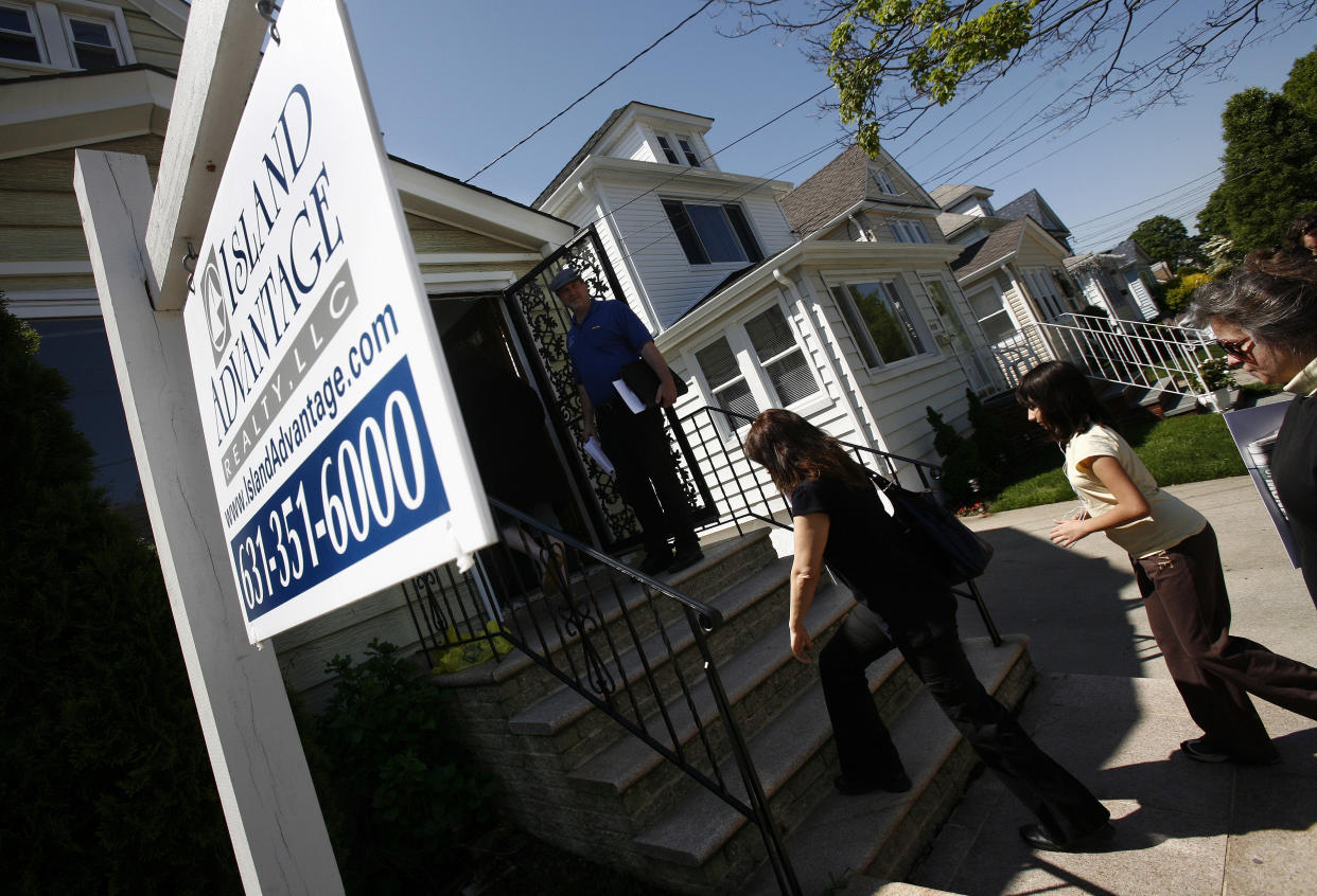 People arrive at an open house in New Hyde Park, New York. (Credit: Shannon Stapleton, REUTERS) 