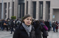 Emma Sinclair Webb, Human Rights Watch Senior Turkey Researcher, speaks to the media before the trial of the Amnesty International's former Turkey chairman and 10 other activists, in Istanbul, Wednesday, Feb. 19. 2020. A court in Istanbul will hand down verdicts for defendants in the closely-watched trial on charges of belonging to or aiding terror groups. The case against activists heightened concerns about Turkey's treatment of human rights defenders. (AP Photo)