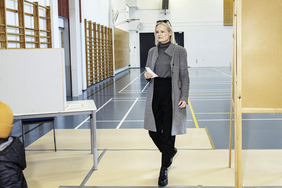 Chairperson of The Finns Party Riikka Purra arrives to cast her vote at a polling station in the Kartanonranta school in Kirkkonummi, Finland, April 2, 2023. (Roni Rekomaa/Lehtikuva via AP)