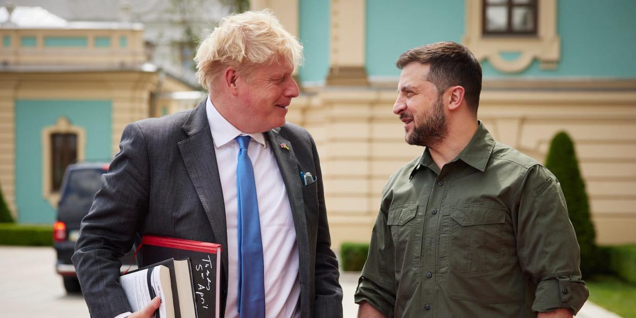 Ukrainian President Volodymyr Zelenskyy and Britain's Prime Minister Boris Johnson talk in Kyiv, Ukraine, in June 2022.