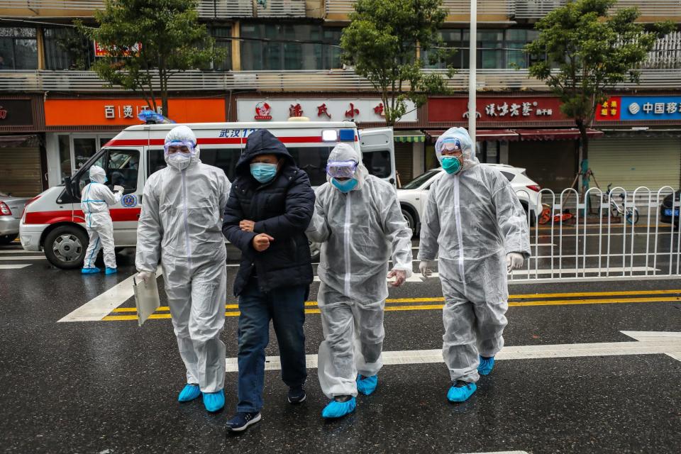 Wuhan China January 26 coronavirus medics help man