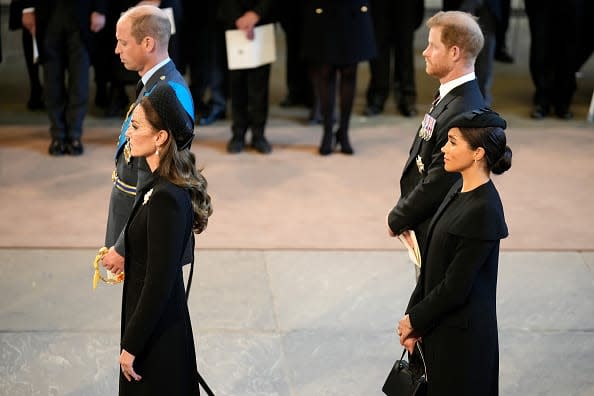 <div class="inline-image__caption"><p>Catherine, Princess of Wales, Prince William, Prince of Wales, Meghan, Duchess of Sussex and Prince Harry, Duke of Sussex pay their respects in The Palace of Westminster after the procession for the Lying-in State of Queen Elizabeth II on September 14, 2022 in London, England.</p></div> <div class="inline-image__credit">Christopher Furlong/Getty Images</div>