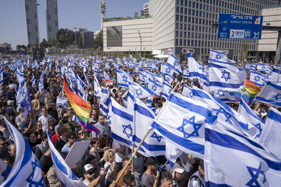 Israelis protest against plans by Prime Minister Benjamin Netanyahu's new government to overhaul the judicial system, in Tel Aviv, Israel, Wednesday, March 1, 2023. (AP Photo/Oded Balilty)
