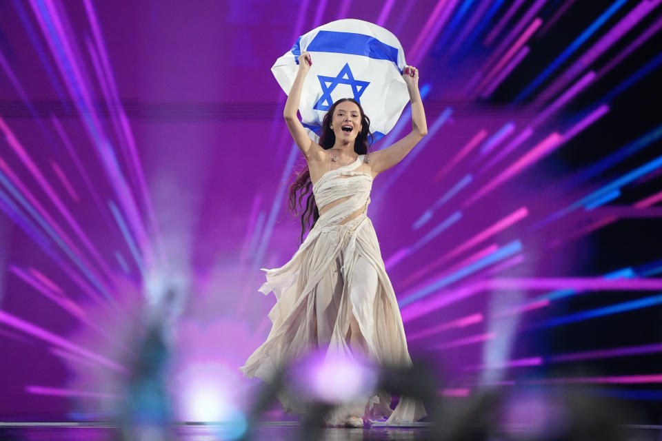 Eden Golan of Israel enters the arena during the flag parade before the Grand Final of the Eurovision Song Contest in Malmo, Sweden, Saturday, May 11, 2024. (AP Photo/Martin Meissner)