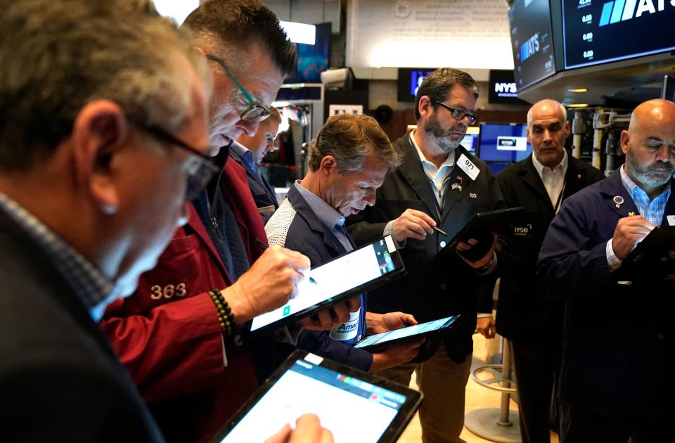 ftse Traders work the floor of the New York Stock Exchange on May 25, 2023, in New York City. Global stock markets struggled May 25 as the US debt standoff dragged on and Germany entered recession, but tech shares surged after US chip firm Nvidia reported bumper earnings thanks to the AI boom. (Photo by TIMOTHY A. CLARY / AFP) (Photo by TIMOTHY A. CLARY/AFP via Getty Images)