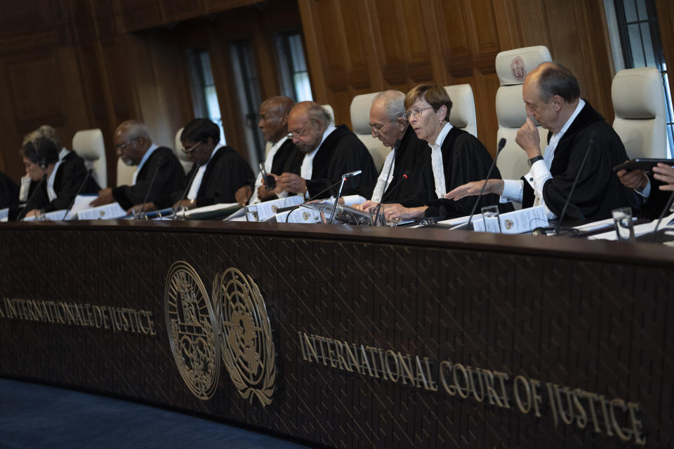 FILE - Presiding judge Joan Donoghue, second right, opens the World Court session where Ukraine's legal battle against Russia over allegations of genocide used by Moscow to justify its 2022 invasion, resumed in The Hague, Netherlands, Monday, Sept. 18, 2023. South Africa has launched a case at the United Nations' top court alleging that Israel's military campaign in Gaza amounts to genocide. The filing and Israel's decision to defend itself at the International Court of Justice sets up a high-stakes showdown in the before a bench of the court's black-robed judges in the wood-panelled Great Hall of Justice. (AP Photo/Peter Dejong, File)