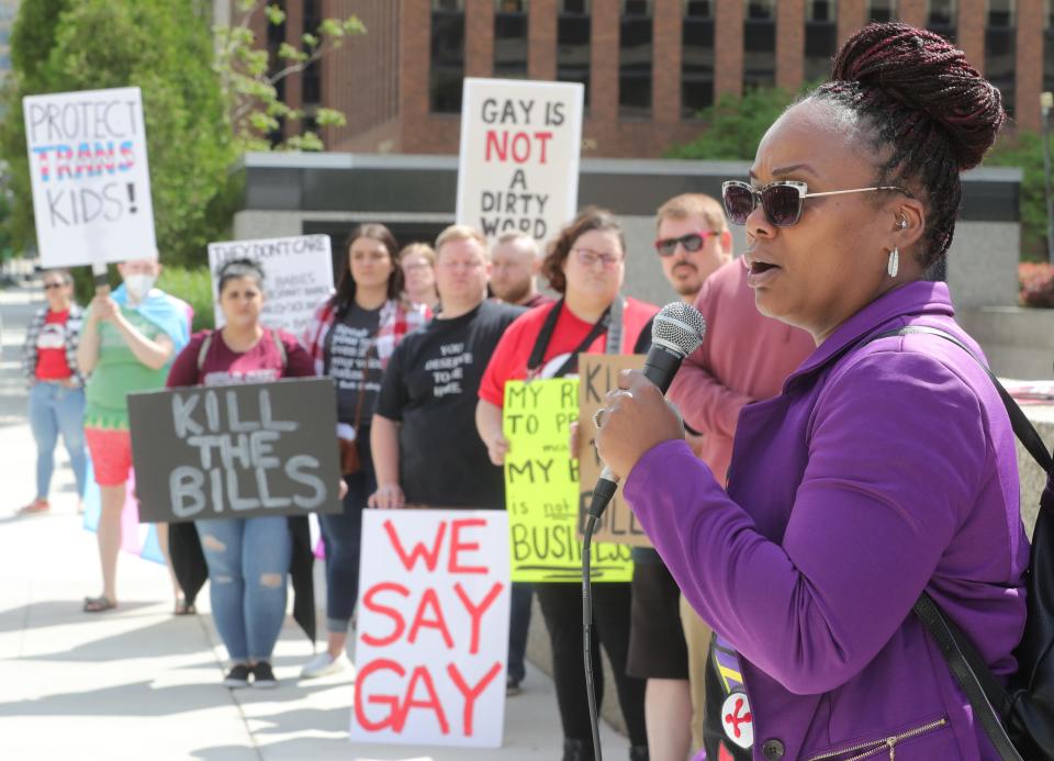 Ericka Malone of Project Ujima and Freedom BLOC speaks to demonstrators at Sunday's rally in Akron.