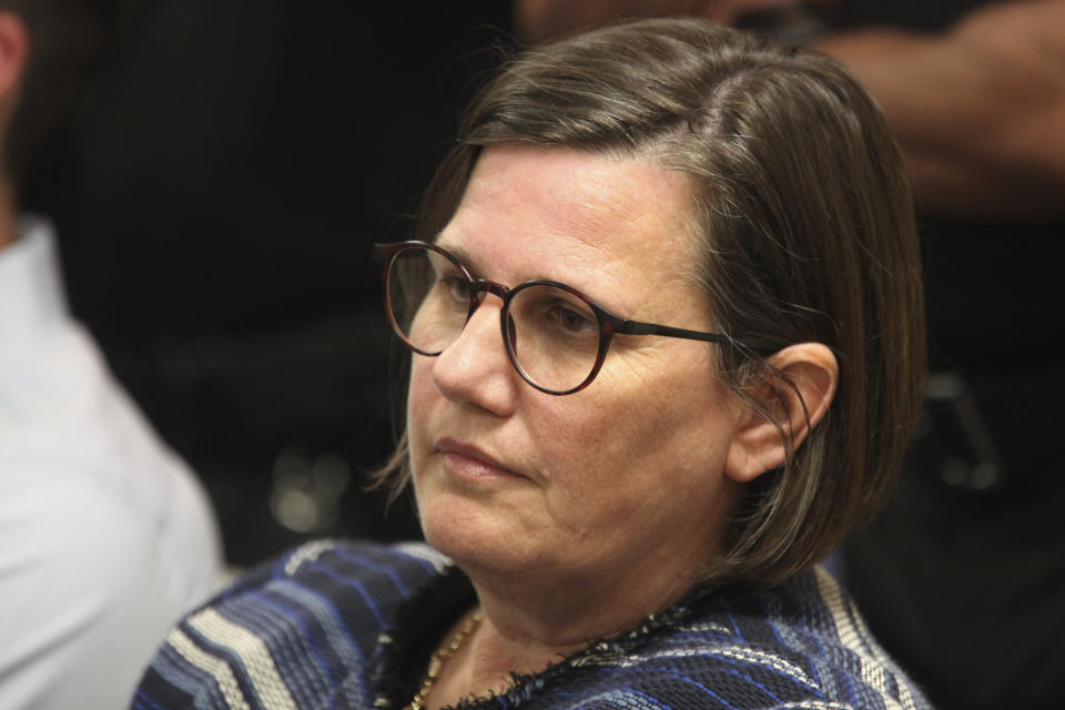 April Holman, executive director of the Alliance for a Healthy Kansas, follows a roundtable discussion in favor of expanding the state's Medicaid program, Tuesday, April 16, 2024, at the Shawnee County jail in Topeka, Kan. Holman's group favors expansion but an effort to force a debate in the state Senate has failed. (AP Photo/John Hanna)