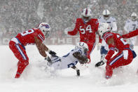 <p>Indianapolis Colts’ Marlon Mack, second from left, is tackled by Buffalo Bills defenders during the first half of an NFL football game, Sunday, Dec. 10, 2017, in Orchard Park, N.Y. (AP Photo/Jeffrey T. Barnes) </p>