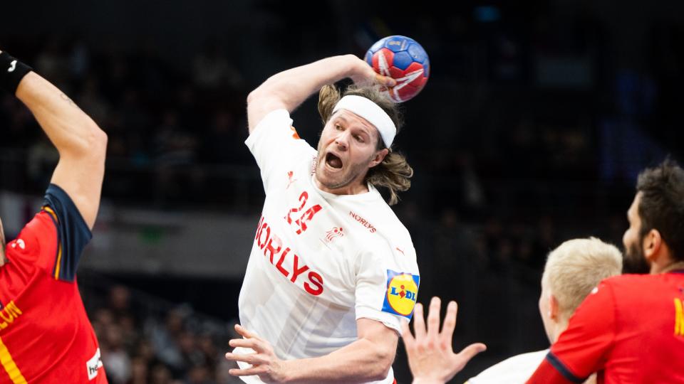  Mikkel Hansen of Denmark, in white shirt, throwing the ball ahead of the Germany vs Denmark semi-final at the Euro 2024 Handball. 
