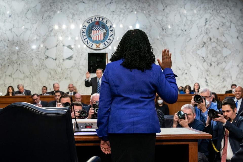 US Supreme Court nominee Ketanji Brown Jackson is sworn in by Senate Judiciary Committee chairChairman Dick Durbin on 21 March, 202 (POOL/AFP via Getty Images)