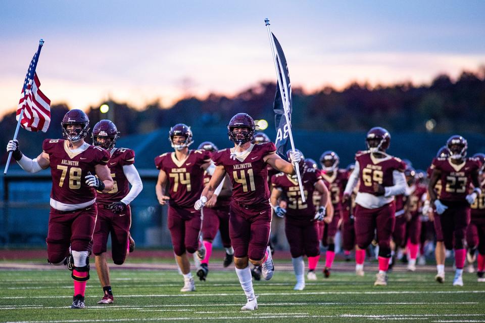Arlington takes the field during the Section 1 class AA quarterfinal football game at Arlington High School in Freedom Plains, NY on Friday, October 28, 2022. Arlington defeated New Rochelle. KELLY MARSH/FOR THE POUGHKEEPSIE JOURNAL