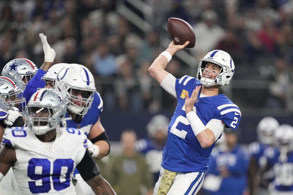 Indianapolis Colts quarterback Matt Ryan (2) throws during the first half of an NFL football game against the Dallas Cowboys, Sunday, Dec. 4, 2022, in Arlington, Texas. (AP Photo/Tony Gutierrez)