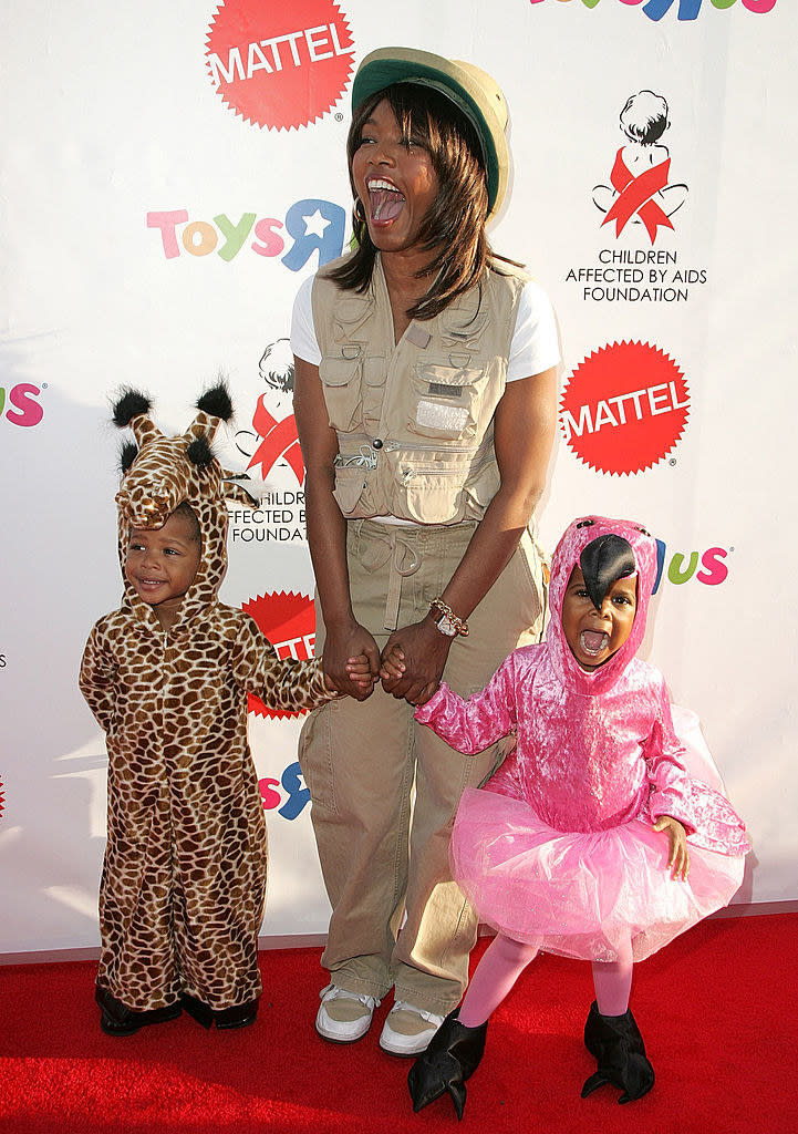 Actress Angela Bassett and her children Slater Vance and Bronwyn Vance attend the AIDS Foundation's 15th annual Dream Halloween benefit