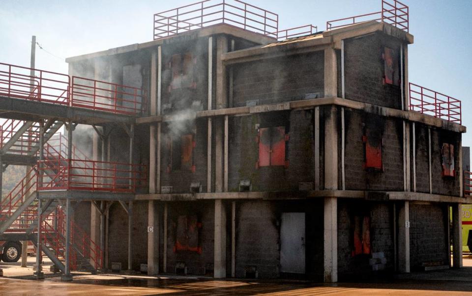 Smoke rises from the burn building at the Centre County Public Safety Training Center during a training session for the firefighters from the University Park Airport on Wednesday, Oct. 11, 2023.