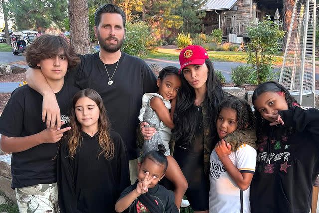 <p>Kim Kardashian/Instagram</p> Mason makes rare appearance in family photo shared on Kim Kardashian's Instagram Story in December 2023