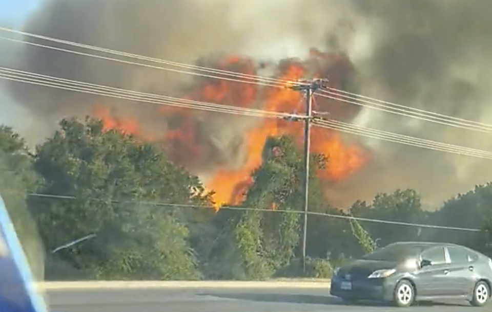 Wildfire in Cedar Park Tuesday, Aug. 8, 2023.