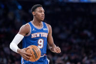 New York Knicks guard RJ Barrett (9) dribbles the ball up the court during the first half of an NBA basketball game against the Los Angeles Clippers, Sunday, Jan. 23, 2022, in New York. (AP Photo/John Minchillo)