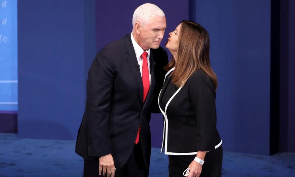 Mike Pence receives a kiss from a maskless Karen Pence, AKA ‘Mother’.