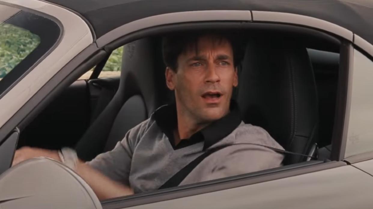  Jon Hamm driving a car in Bridesmaids. 