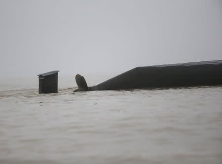 The sunken ship is seen in the Jianli section of Yangtze River, Hubei province, China, June 2, 2015. REUTERS/Kim Kyung-Hoon