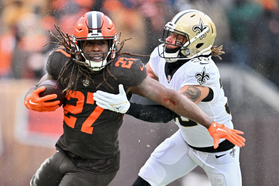 Kareem Hunt (left) reportedly visited the Saints on Tuesday and is headed to the Colts for a visit on Wednesday. (Photo by Jason Miller/Getty Images)