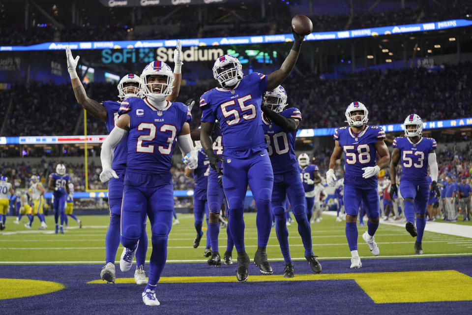 Buffalo Bills defensive end Boogie Basham (55) celebrates with teammate after interception a pass during the second half of an NFL football game against the Los Angeles Rams Thursday, Sept. 8, 2022, in Inglewood, Calif. (AP Photo/Mark J. Terrill)