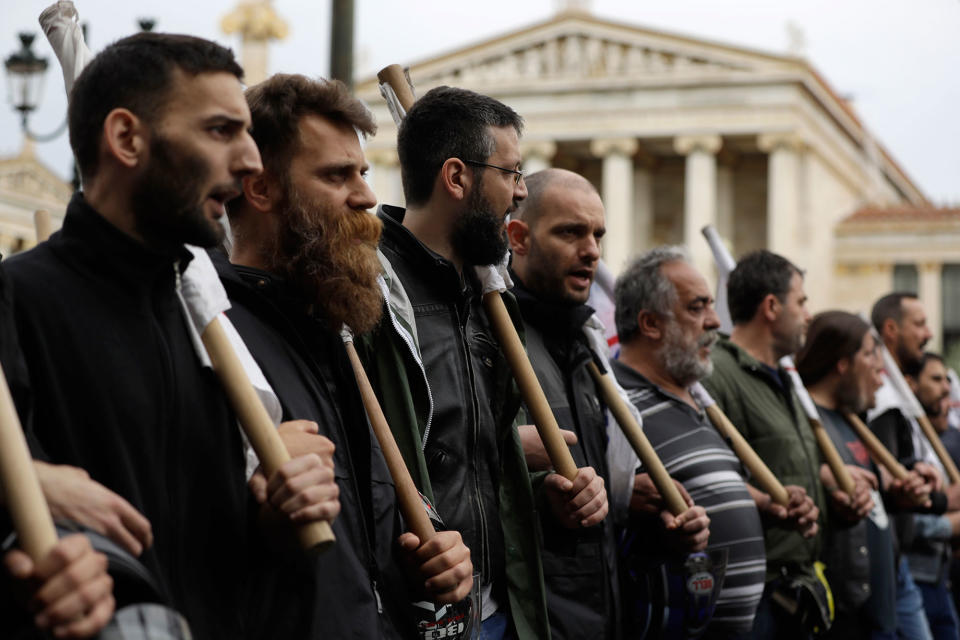 <p>Protester of the Communist-affiliated union PAME chant slogans during a nationwide general strike in Athens Wednesday, May 17, 2017. Greek workers walked off the job across the country Wednesday for an anti-austerity general strike that was disrupting public and private sector services across the country. (AP Photo/Thanassis Stavrakis) </p>