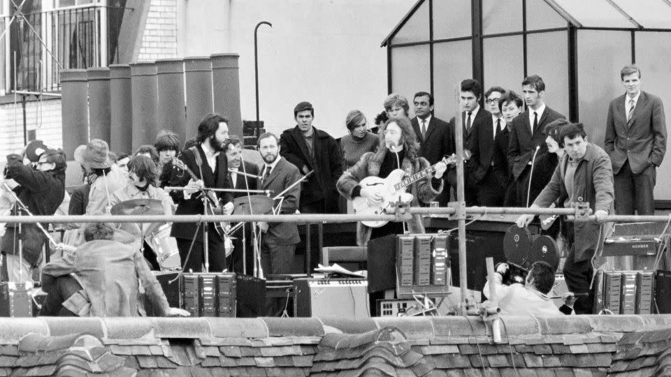 The Beatles, pictured on a London rooftop during their last live performance - Daily Mirror/Mirrorpix/Getty Images
