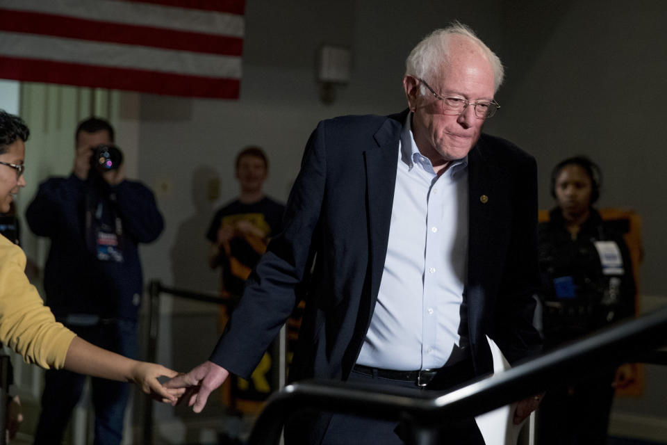 Democratic presidential candidate Sen. Bernie Sanders, I-Vt., takes the stage at a climate rally with the Sunrise Movement at The Graduate Hotel, Sunday, Jan. 12, 2020, in Iowa City, Iowa. (AP Photo/Andrew Harnik)