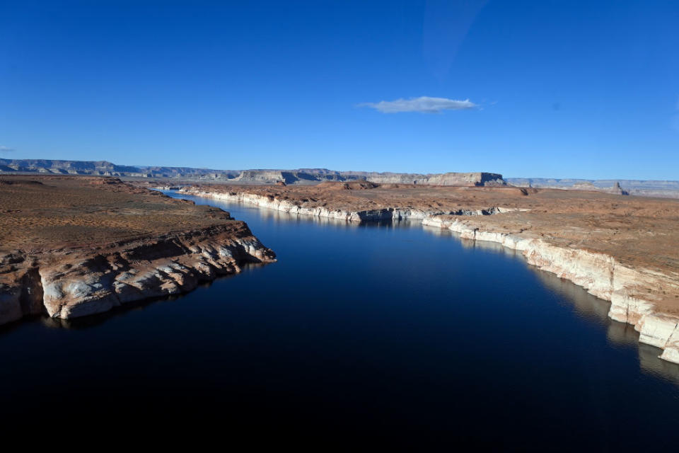 Water flows along Lake Powell on October 23, 2022 in Page, Arizona.<span class="copyright">Joshua Lott—The Washington Post/Getty Images</span>