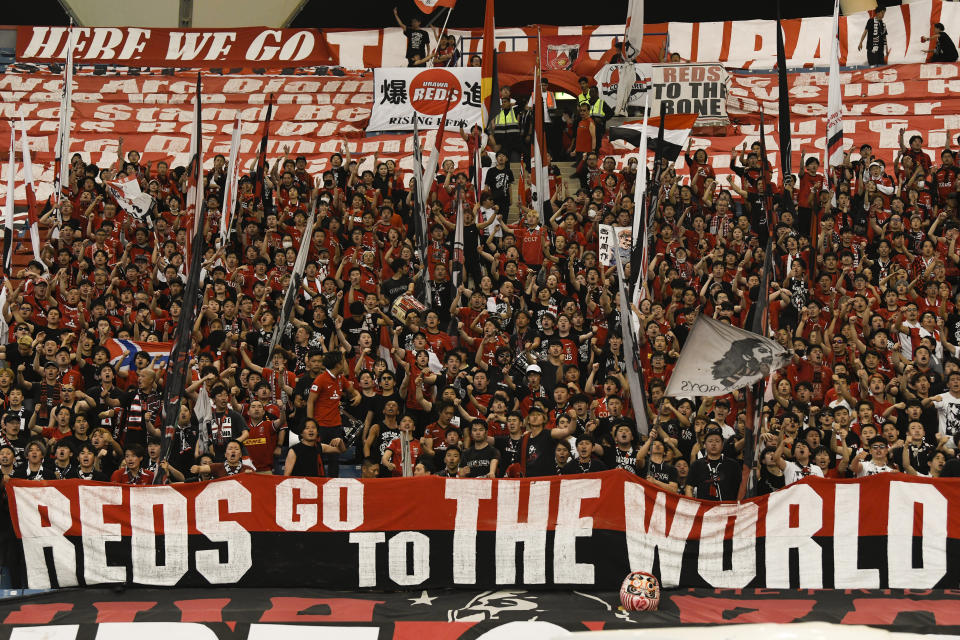 Japan's Urawa Red Diamonds' fans cheer on during their team soccer match with Saudi Arabia's Al Hilal in the first leg of the Asian Champions League, (ACL), final at King Fahd International Stadium, in Riyadh, Saudi Arabia, Saturday, April 29, 2023. (AP Photo)