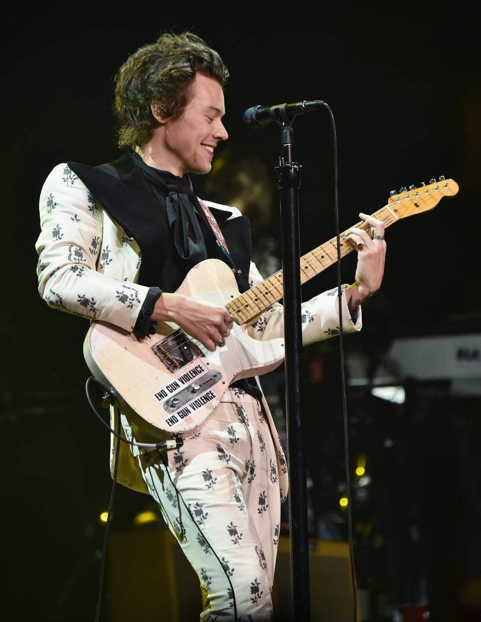 Printed suits? Check. Ruffled blouses? Double check. Harry Styles rules the red carpet in these campiest looks.