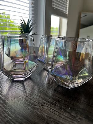 A set of iridescent stemless wineglasses whose fun diamond shape adds a little va-va-voom to the drinking experience